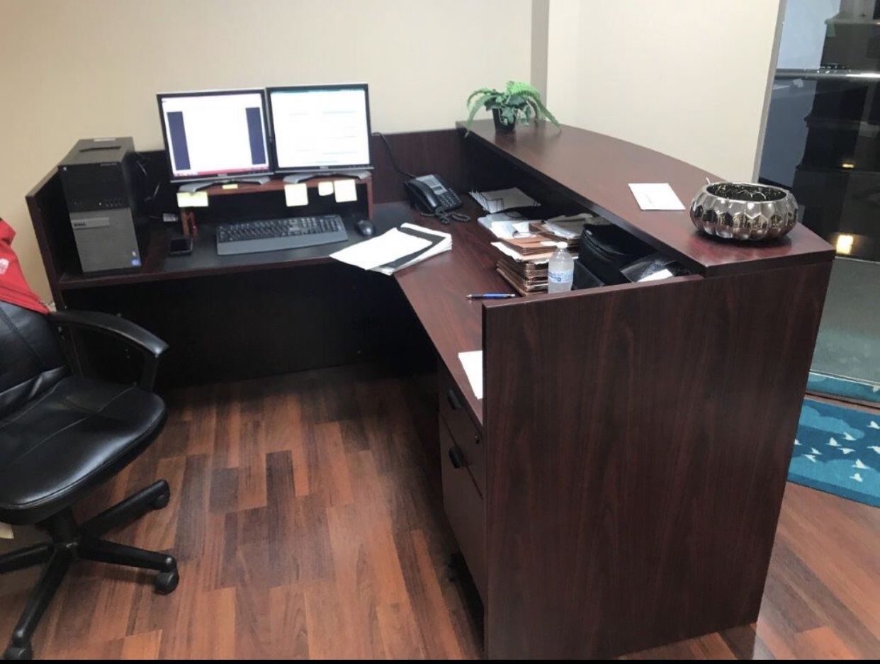 Desks chairs and conference tables