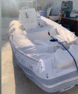 2000 Caribe Inflatable Center Console Boat with 70HP Nissan