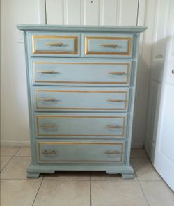 light blue dresser with 5 drawers and gold accents 4ft H x 3ft W x 20"D