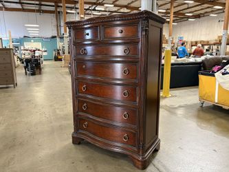 Vintage Cherry Finished 7 Drawer Wavefront Chest with Floral Brass Pulls
