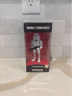 MINIX Star Wars Stormtrooper collectible figure, specifically number 130 in the series.The PVC figure stands approximately 12 cm or 4.7 inches tall