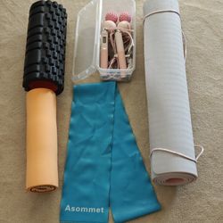 Moving sale! Training set. Yoga mat, foam roller, resistance band, jump rope, and massage ball.