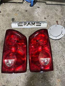 2008 Dodge Ram stock tail Lights and Gas Cover and Bed light Cover Silver Color