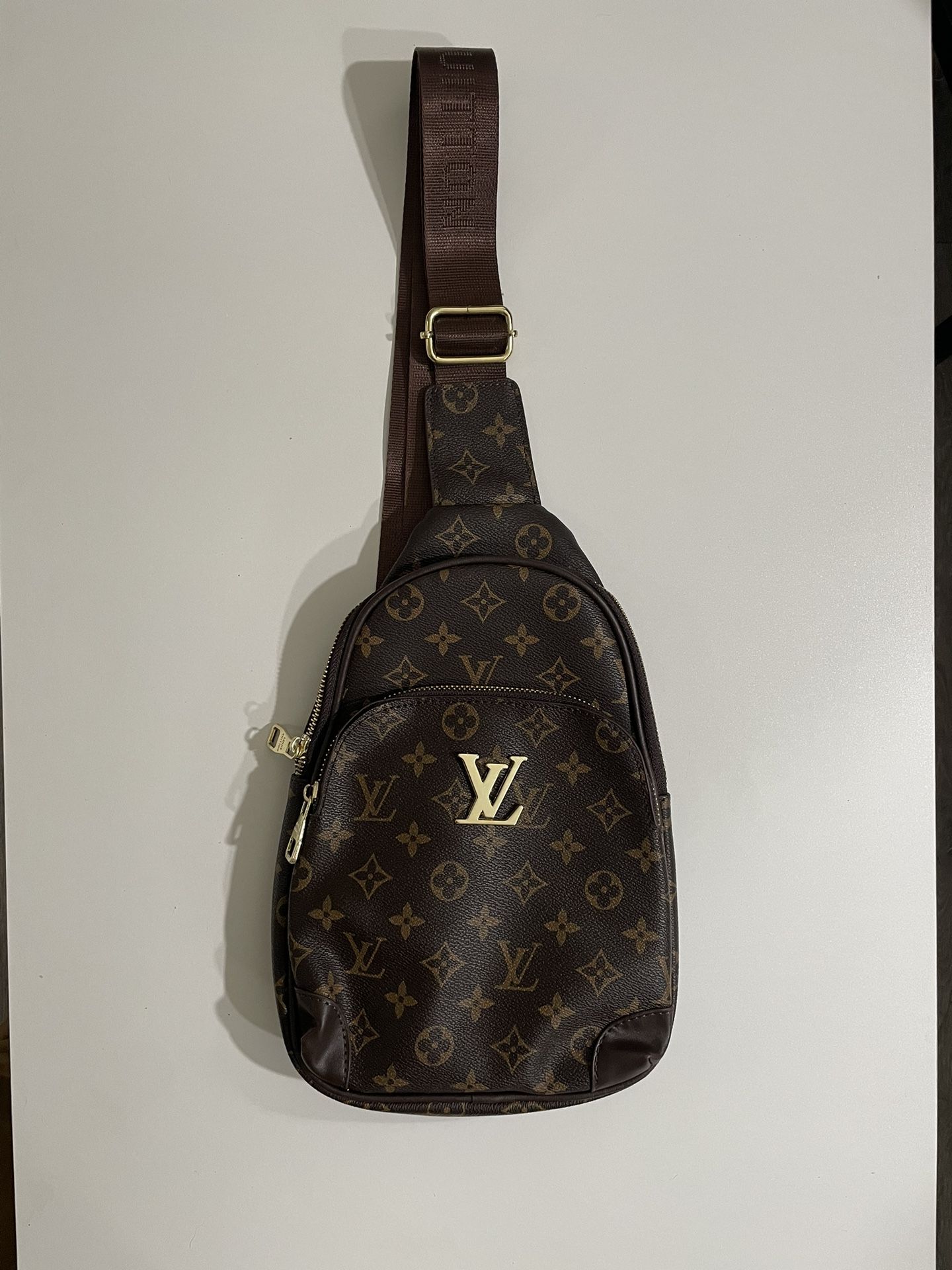 Louis Vuitton Brown Monogram Canvas Calfskin Double Zip Closure Sling  Backpack for Sale in Phoenix, AZ - OfferUp