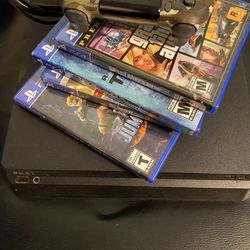 PS4 With Controller And Games