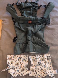 Like new dark green happy baby revolution carrier