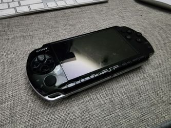 Sony PSP 3000 Bundle – 64GB Memory Card, OEM Charger, Extra Battery