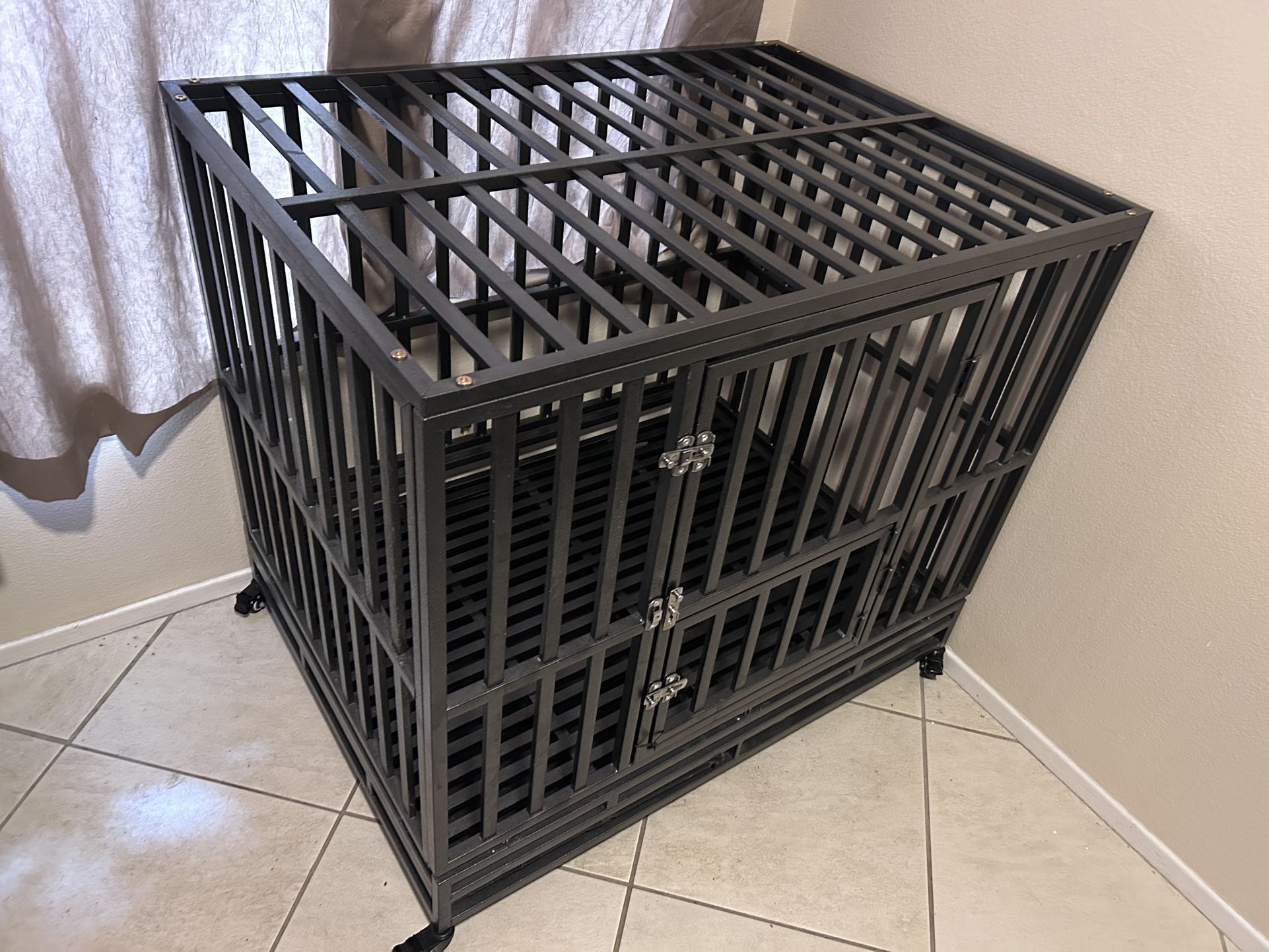 Two dog crates available, heavy duty, large dog