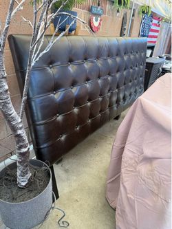 Dark brown leather headboard