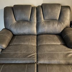 2 Piece Reclining Sectional And Dining Set