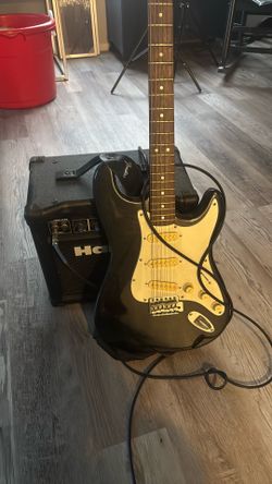 Lotus guitar with bass amp