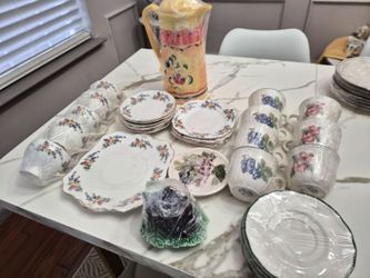 Tea Cups And saucers,  Thermos,  Sugar Bowl