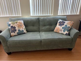 Signature Design by Ashley Kylee sofa in Lagoon sofa