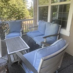 Hampton Bay Marina Point 5-piece Patio furniture (4 seater with light blue cushions) and table