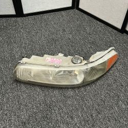 2002-2005 Buick Century,  97-04 Regal  OEM  PASSENGER SIDE HEADLIGHT ASSEMBLY