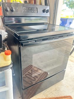 Black matching microwave and stove