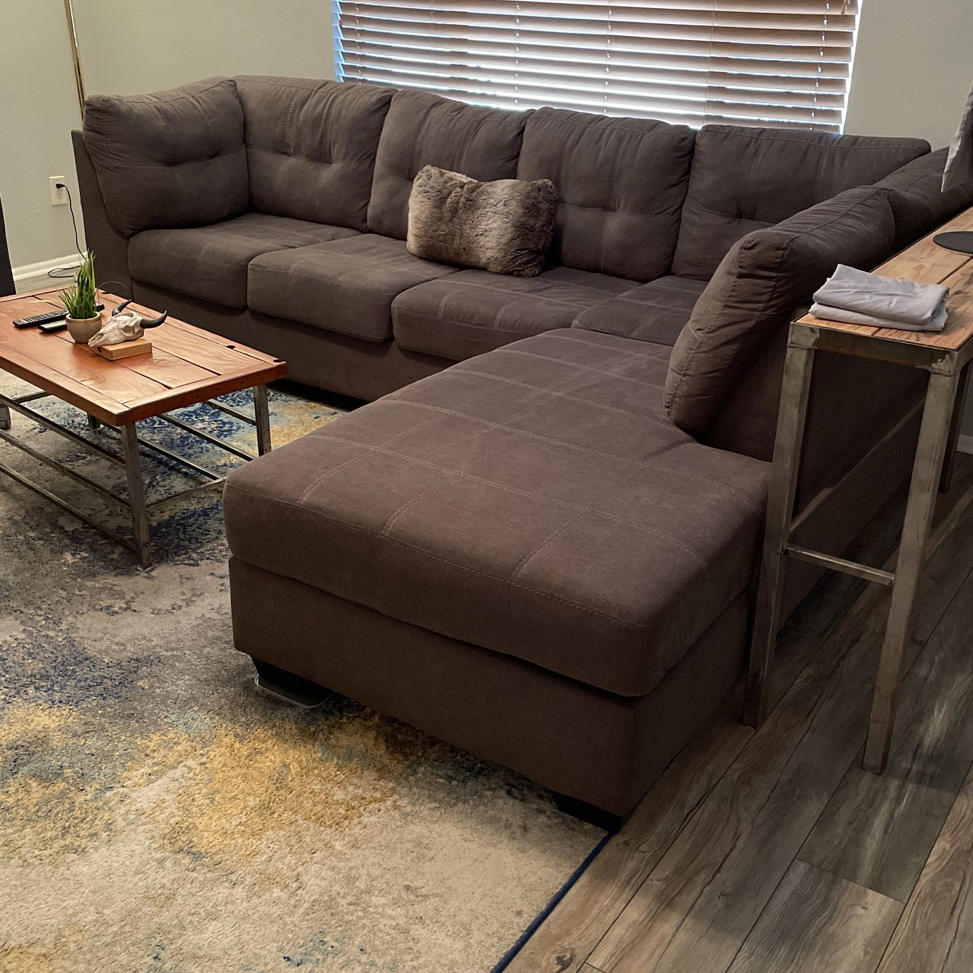 Grey Sectional With Pullout Queen Sleeper And Ottoman  
