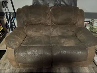 Sofa and loveseat in fair condition both recliners