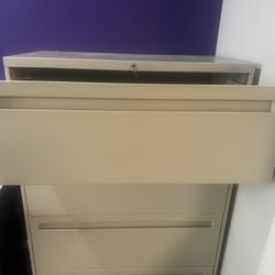 File Cabinet 4 Plus Ft Tall  3 Ft Plus Wide.  Key 