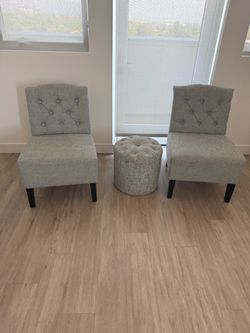 Two chairs and foot rest