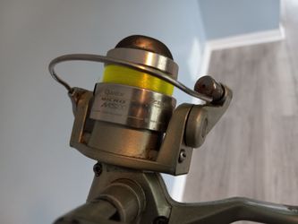 Quantum Micro 500 size reel on 5'6" Zebco rod Fishing