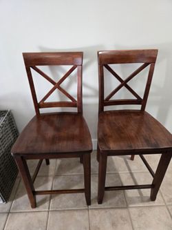 Free wood dining chairs for table or bar.