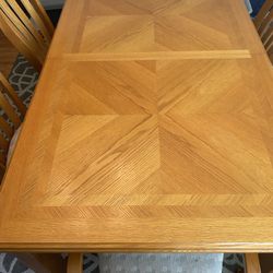 Dining Table In Six Matching Chairs