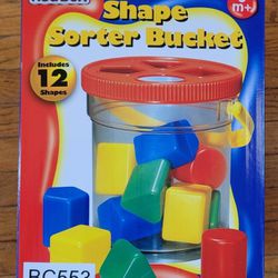FREE  Shape Sorter Bucket NEW with Any Purchase. One Free Item Per Customer. Pick-up In Aurora.