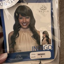 Sepia Indigo Wig Stylish long wig with a natural look. Perfect for any occasion.