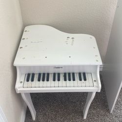 White Fictional Toddler Piano 