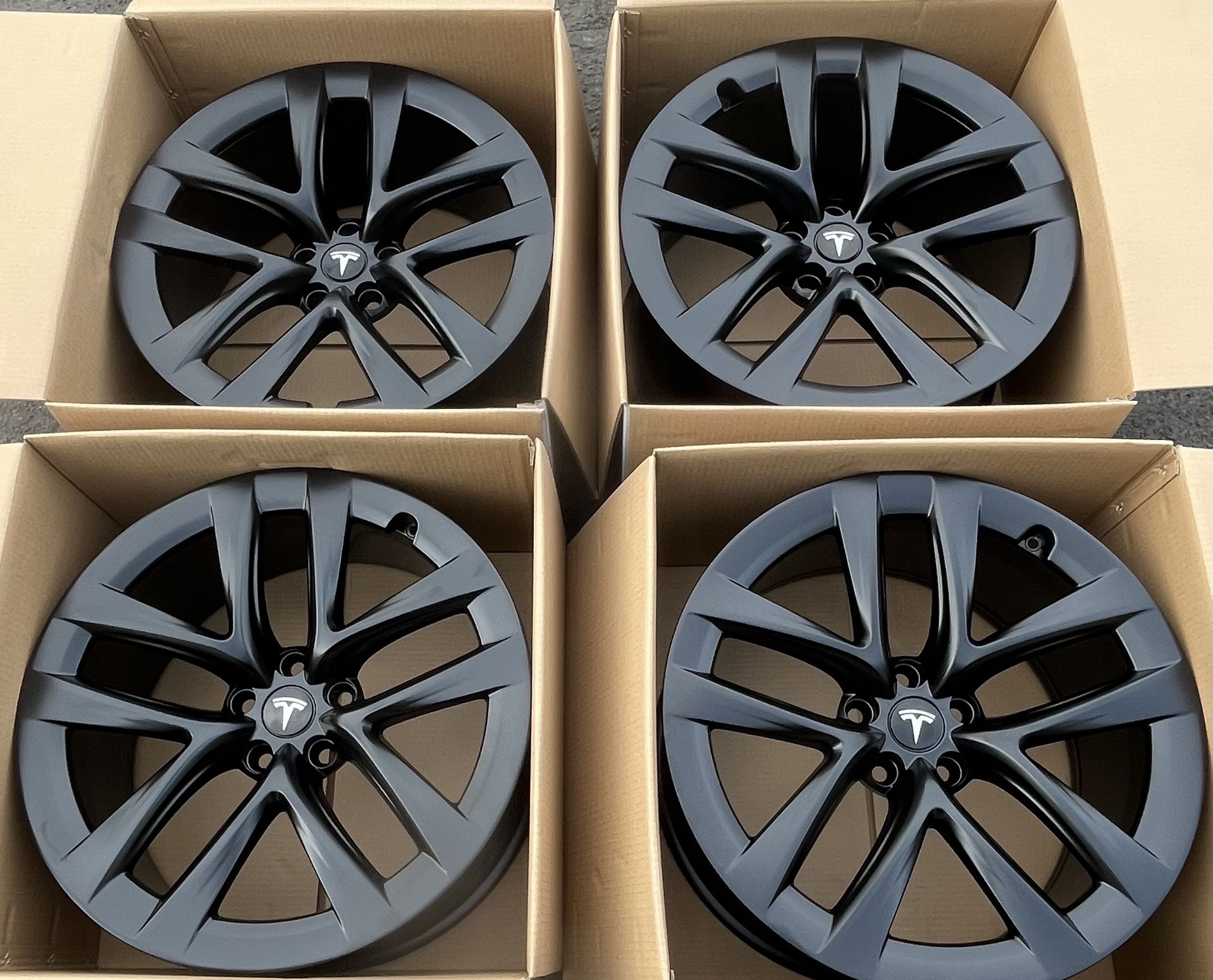 “21 Tesla model S Satin Black rims/wheels (exchange available)