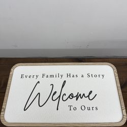 Disney Winnie the Pooh wall art featuring a clean sketch-style design of Pooh and Piglet in a field of flowers. Framed in a wood-tone finish. 	•	Offic