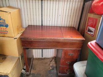Old sewing table with three drawers