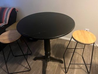 Pub style table with bar stools