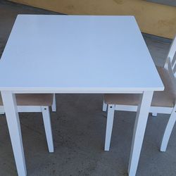 White Table And Chairs  Like New" 