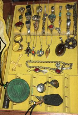 Silver ring with earrings with bracelet is Nicholas middle east necklace is