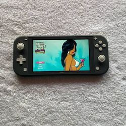 NINTENDO SWITCH LITE with 125 SWITCH GAMES