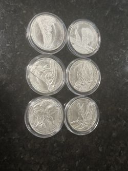 Six Lost world 1 Oz silver rounds