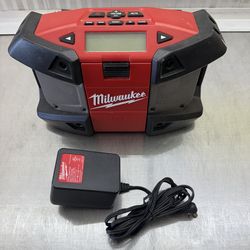 Milwaukee M12 radio and AC adapter (CASH ONLY).