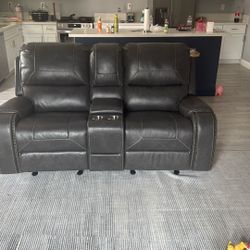 Brand New Never Used Grey Leather Swivel Recliners