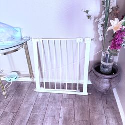Baby safety gates for stairs or rooms and 2 baby play pans
