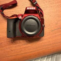 Nikon Camera, Flash Light And Tripod