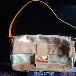 Fendi purse. Tan,rabbit fur,leather, blue interior