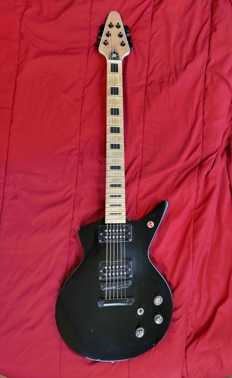 Dean Cadillac with aftermarket neck.