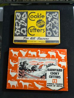 Vintage cookie cutters on original boxes, animals, seasonal