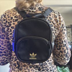 Adidas, mini black and gold backpack used
