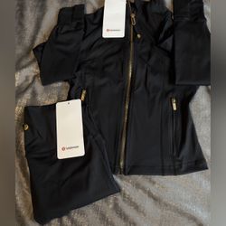 brand new black an gold lululemon set