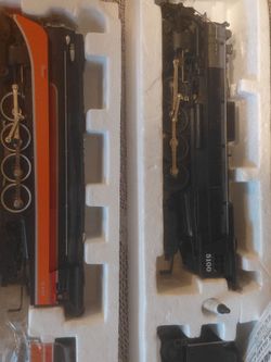 LOCOMOTIVES AND TENDERS