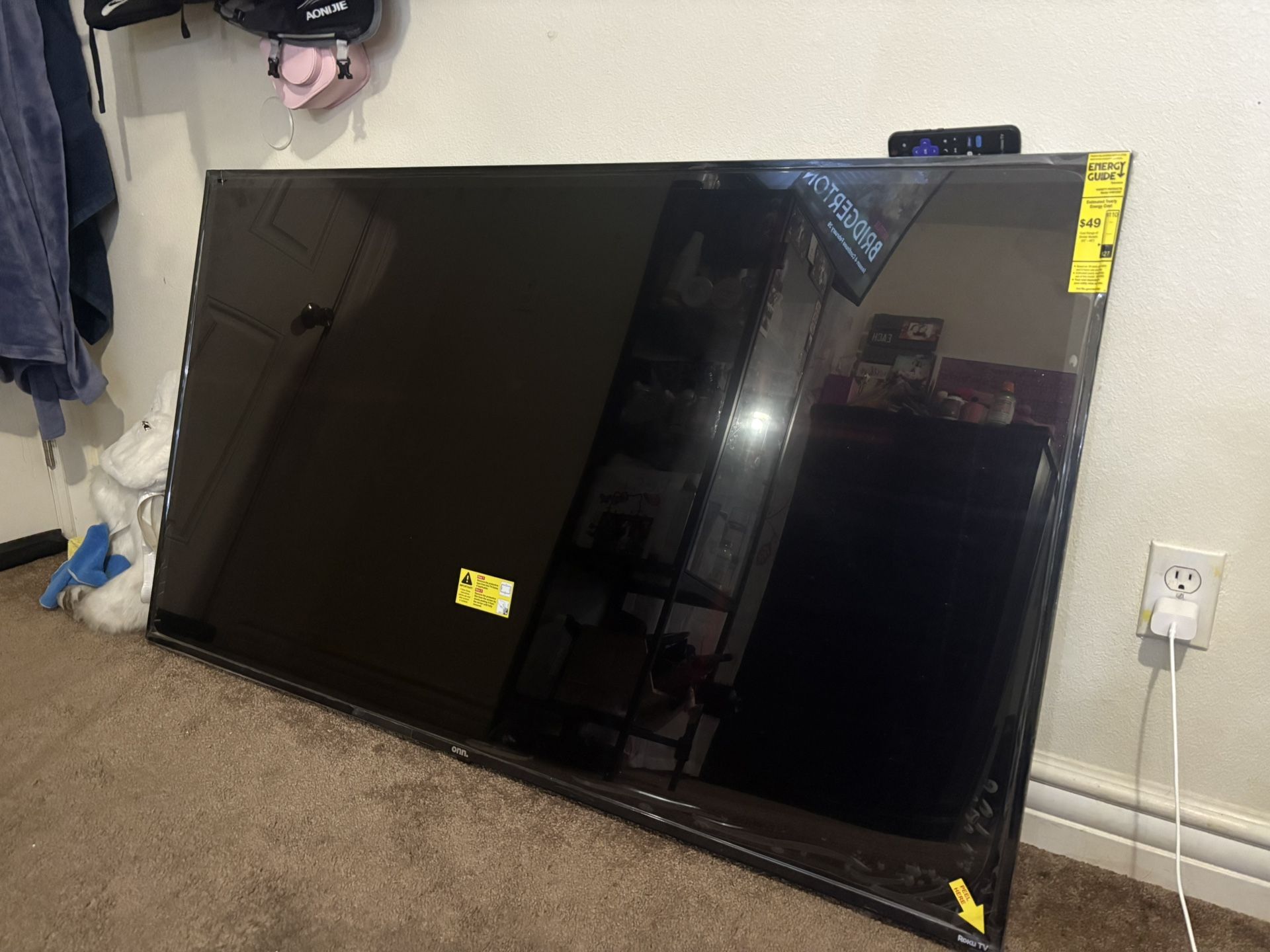 Brand new 65” Onn Roku Smart TV.