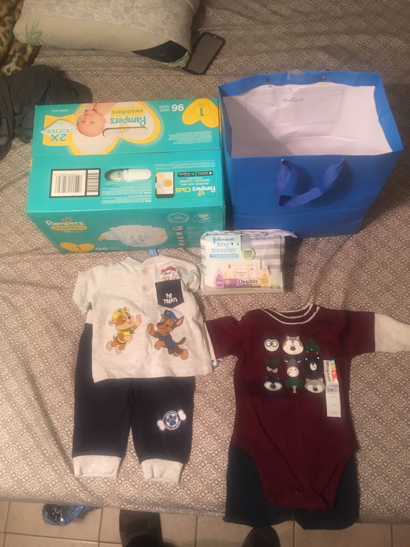 Pampers size 1 and baby clothing